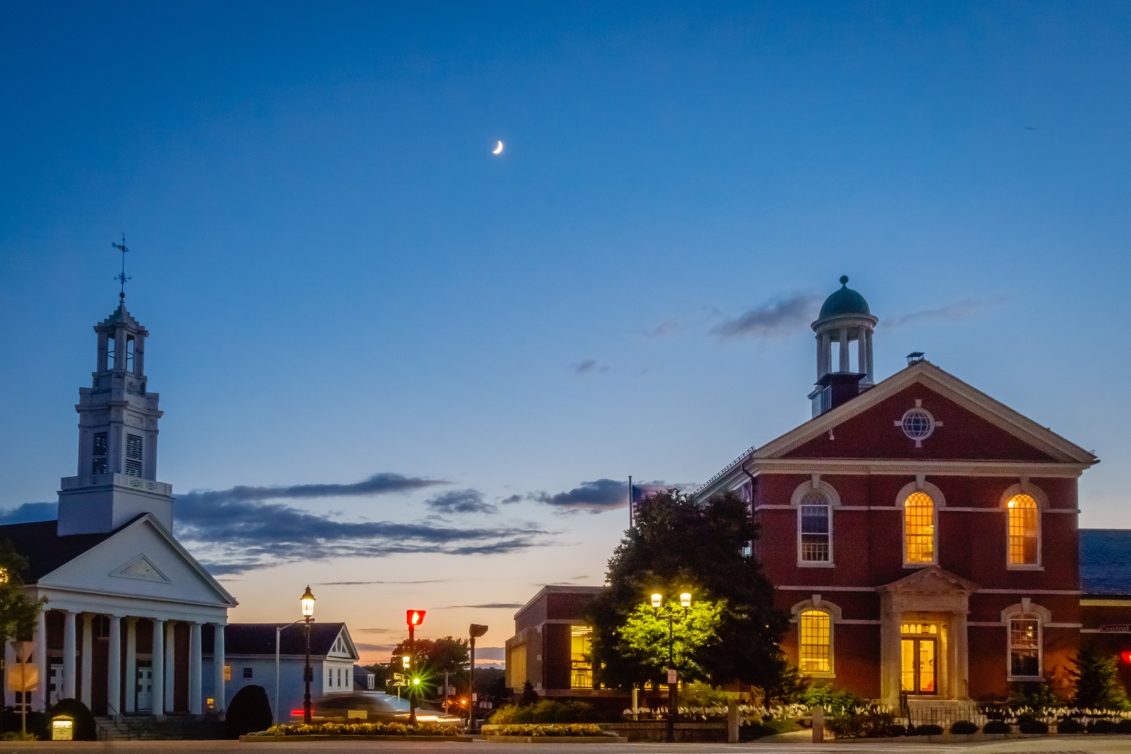 Downtown Andover, Massachusetts at dusk &mdash; Old Town Hall and Christ Church with a crescent moon overhead